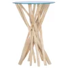 Table haute avec plateau en verre rond et pied sculptural composé de branches en bois de teck flotté naturel, style rustique et organique.