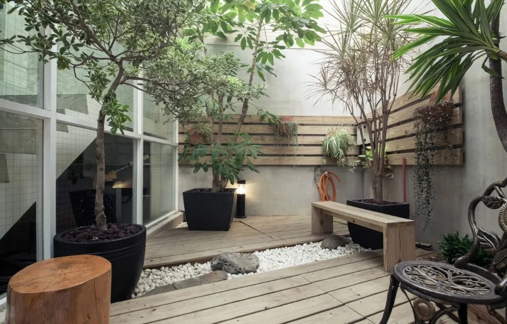 terrasse bois moderne jardin sec galets blancs banc bois minimaliste